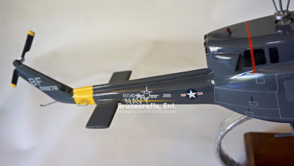 Model of UH-1N Twin Huey US NAVY 103 Aircraft with detailed craftsmanship.